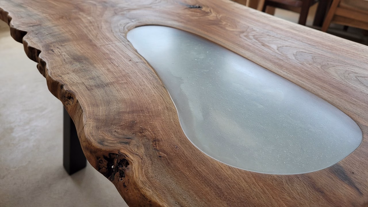 Finished live-edge tabletop with a smooth resin center — Custom Woodwork in Rock Hill