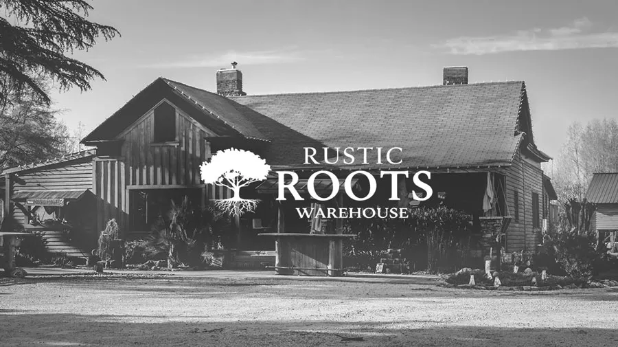 front entrance to Rustic Roots Warehouse with main building and logo as mobile version